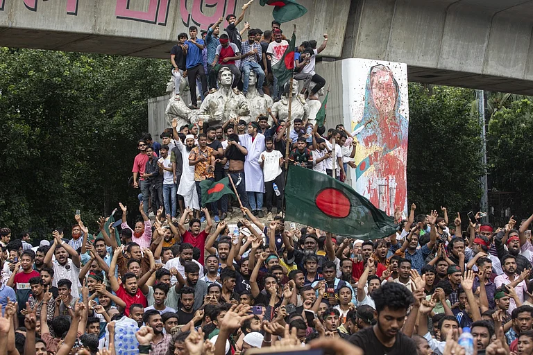 Protestors deface graffiti of former PM Sheikh Hasina in Bangladesh - AP